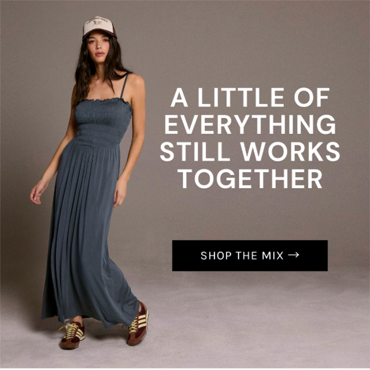 Chaser Marquise Maxi Dress in Future Grey styled with sneakers and a cap in a relaxed studio setting featuring an effortless full-length summer look