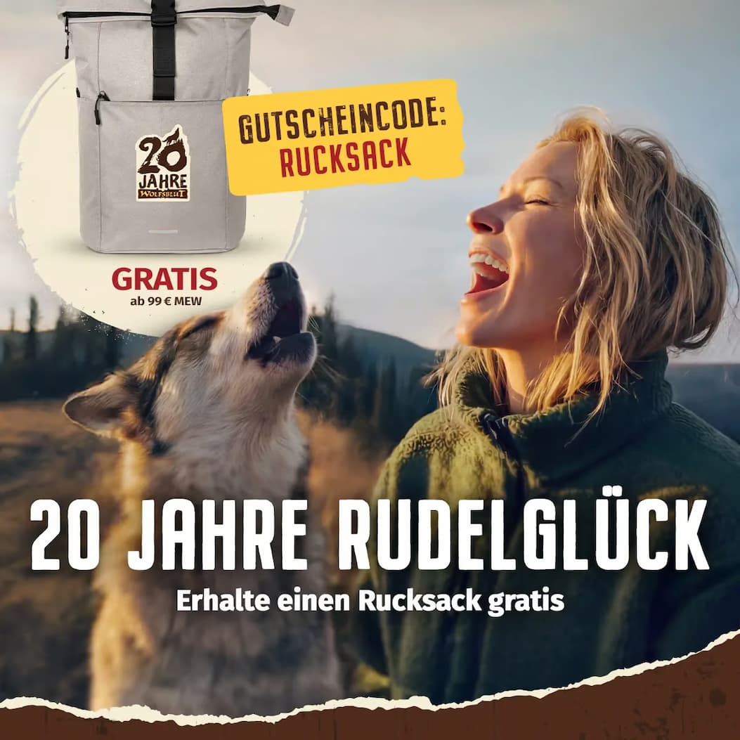 Frau mit Hund und ein Wolfsblut Rucksack