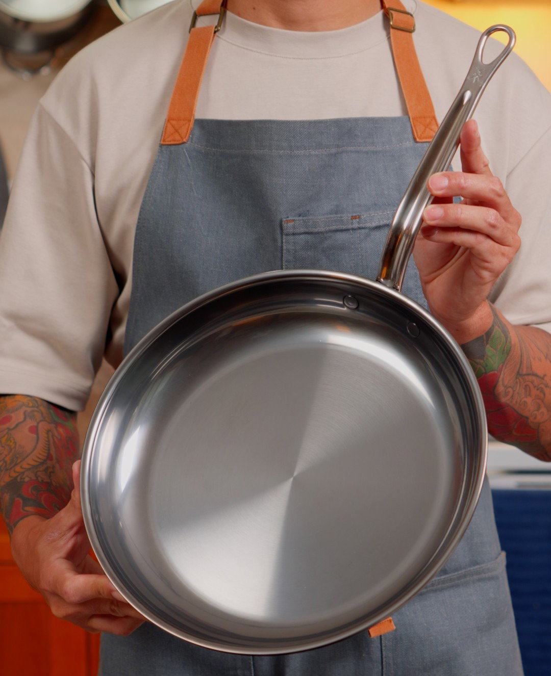 IMG: Philip Lemoine holding the Hestan NanoBond skillet