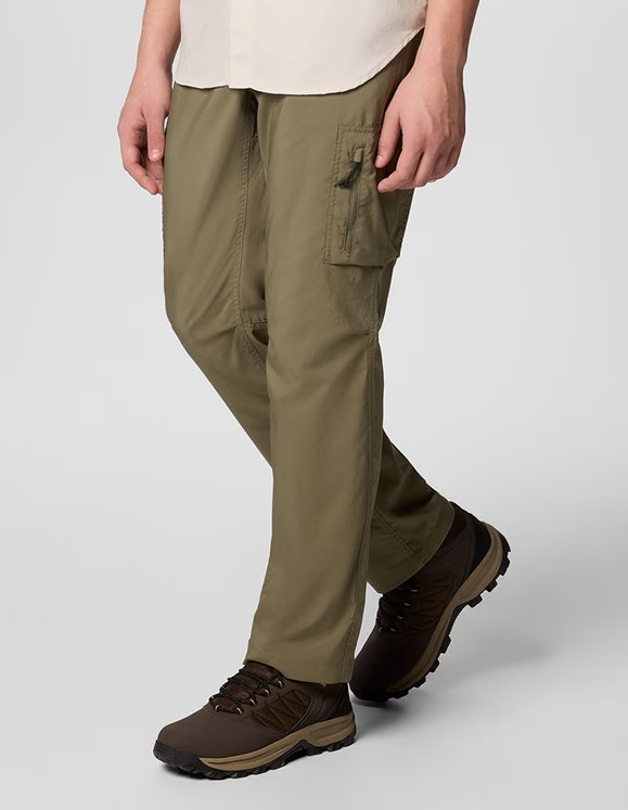 Close up of a man in Columbia hiking pants and boots.