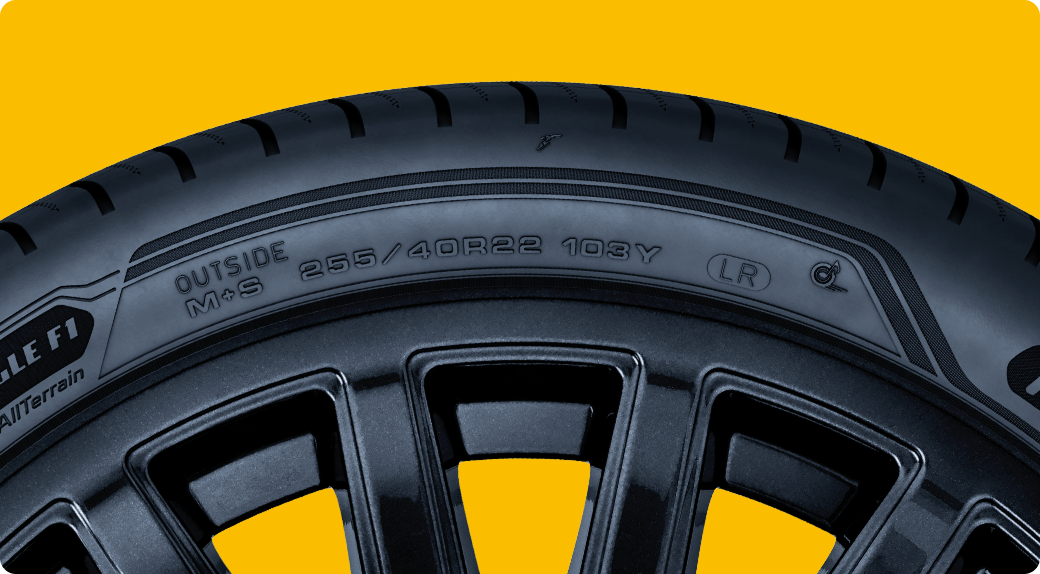 Goodyear Tire on Yellow Background