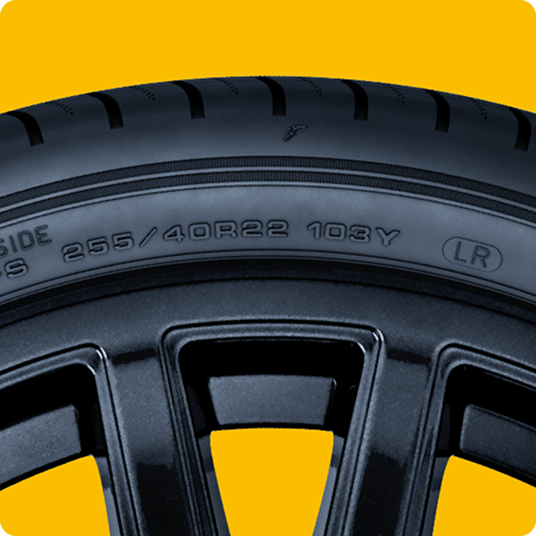 Goodyear Tire on Yellow Background