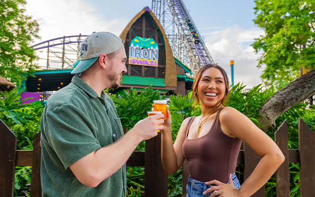 Two friends enjoying free beer samples at Busch Gardens
