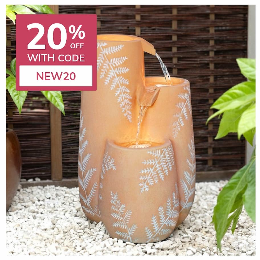 A CALMING FOCAL POINT Cut-Out Panel Garden Water Feature