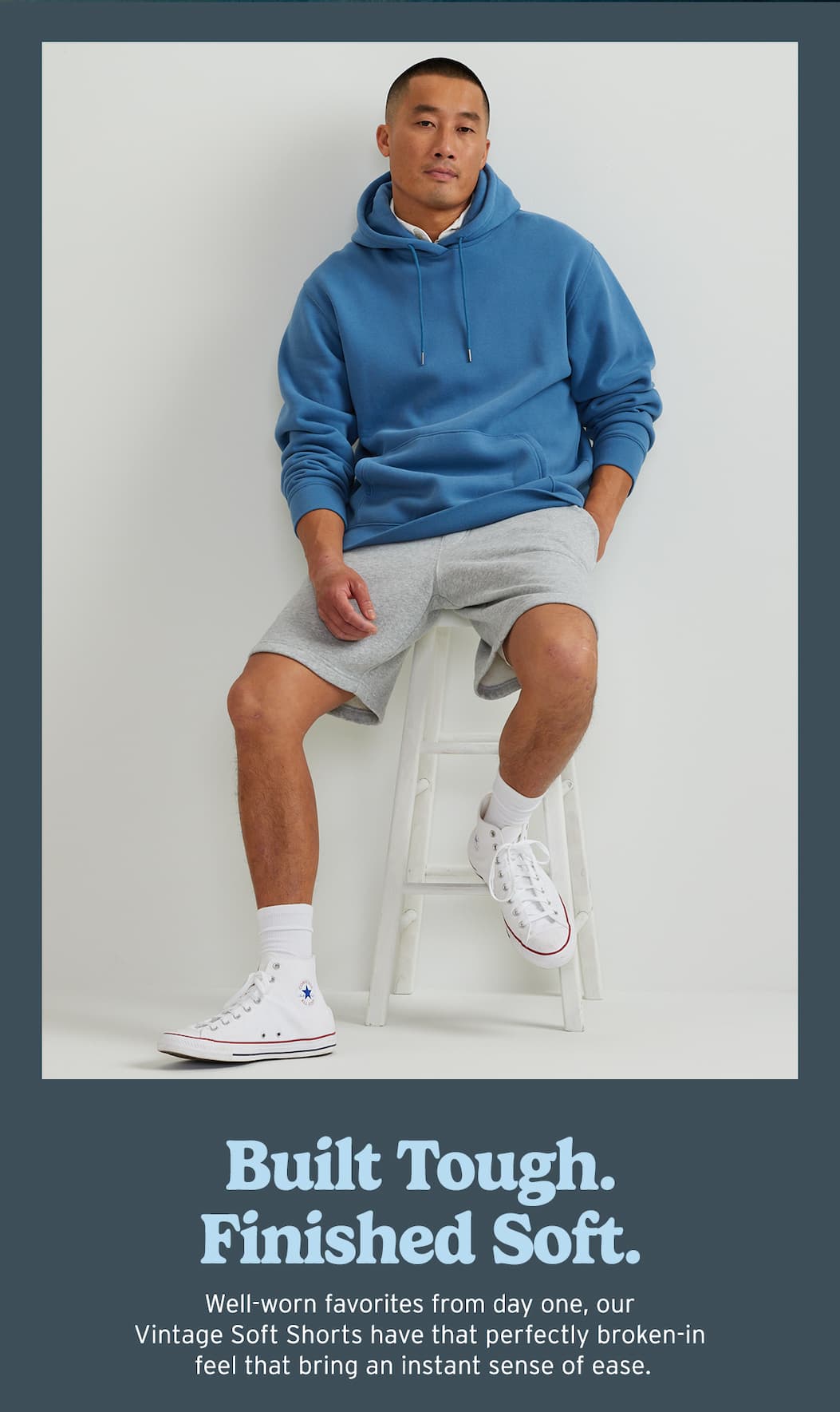 Man in Vintage Soft shorts and hoodie