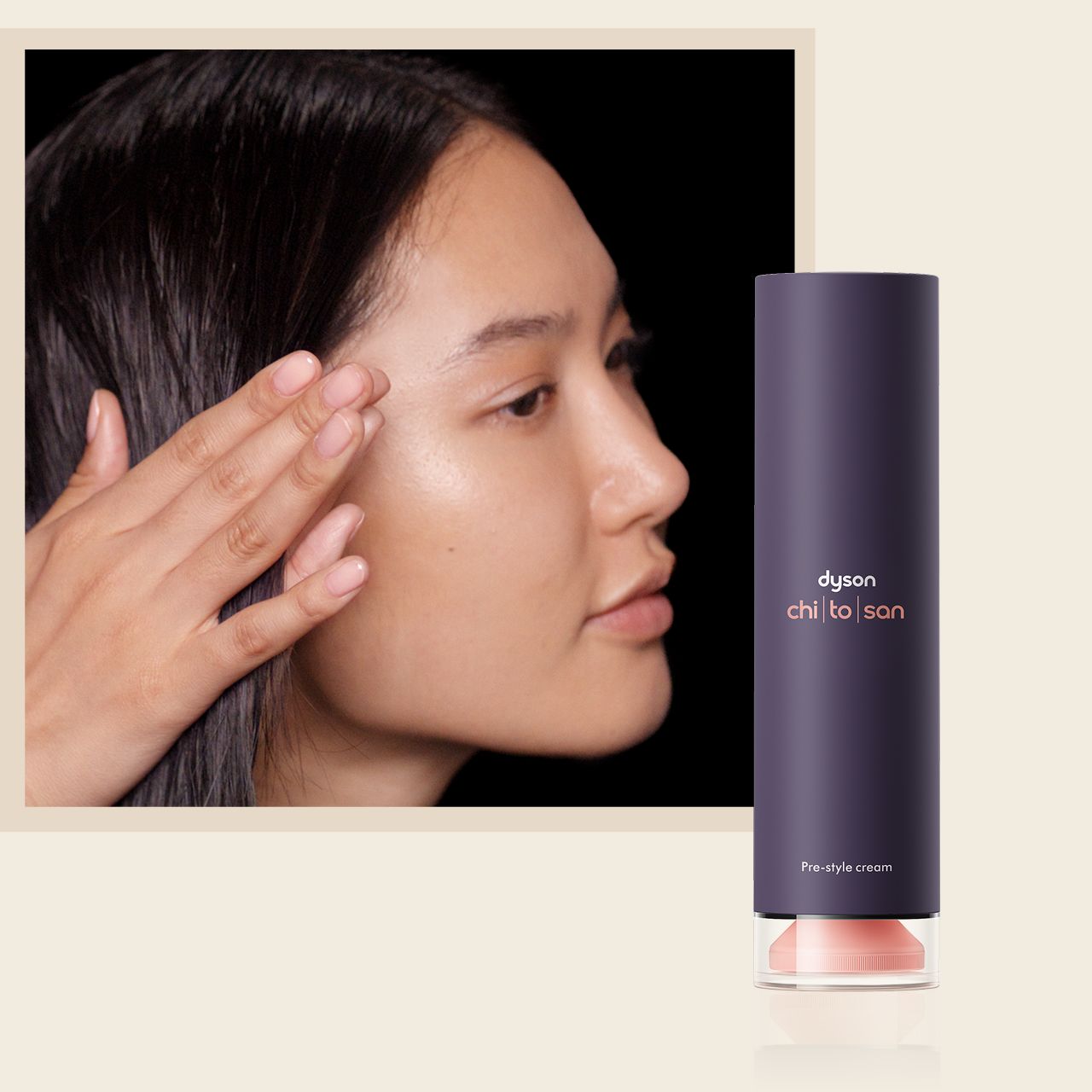 A model smooths Dyson Chitosan Pre-style cream through her hair.