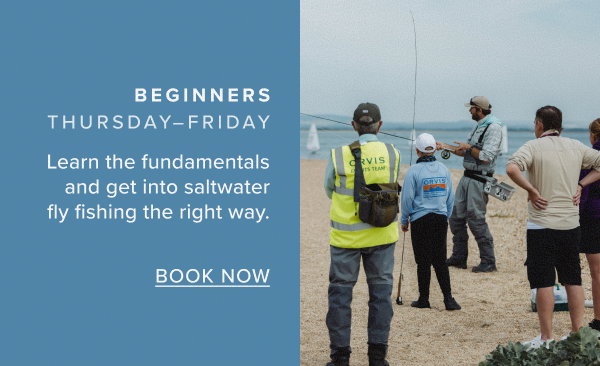 Beginner anglers stood on the beach getting instructed by one of our expert guides. Book your Beginners Ticket today.