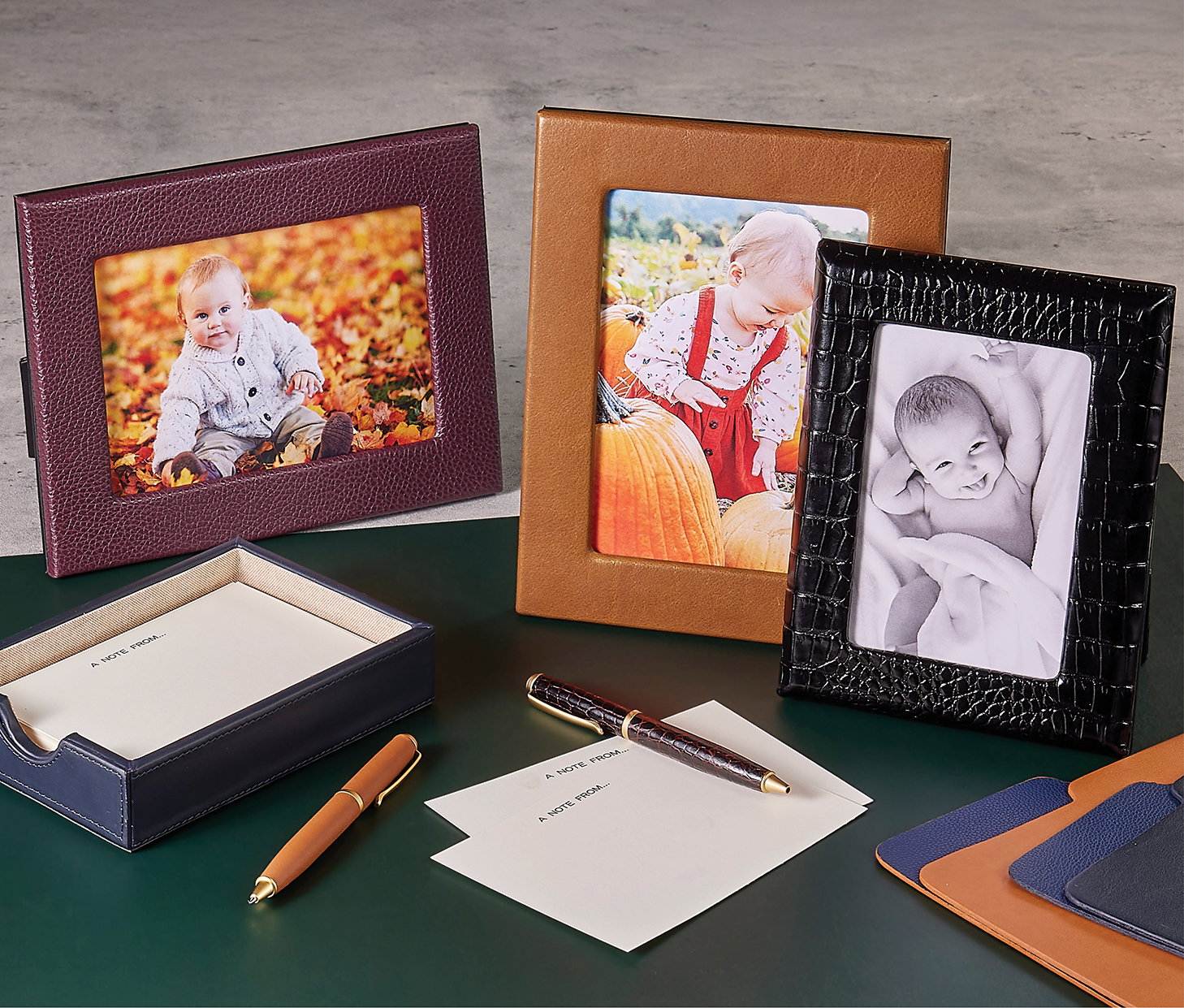 Leather picture frames in Wine, British Tan, and Black Embossed Croc.