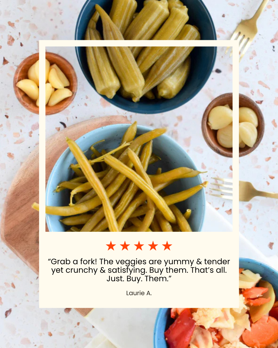 Overhead shot of bowls filled with pickled okra, green beans, and garlic cloves on a speckled table with gold forks. A text overlay shows a 5-star customer revi