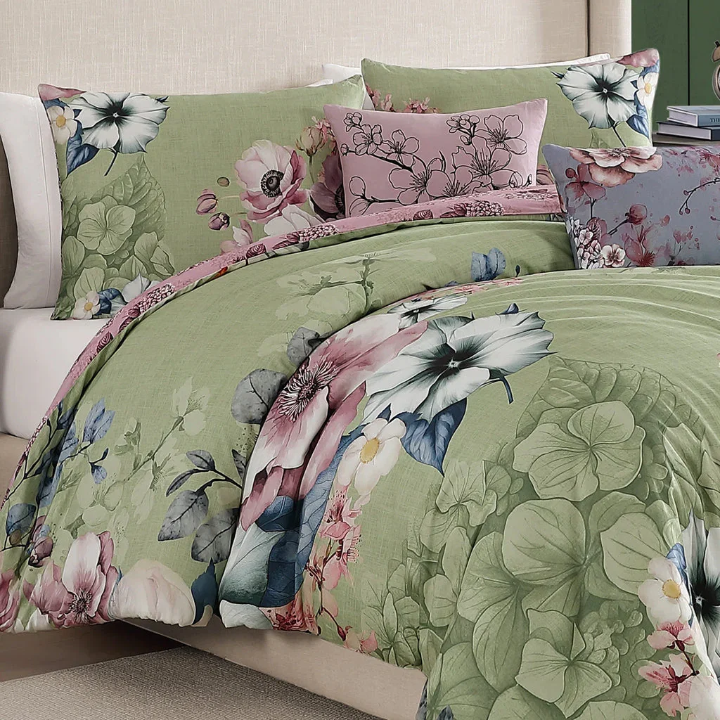 Bebejan floral bedding set with green duvet, pink and white flowers, and coordinating decorative pillows on bed.