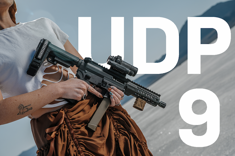 Woman holding UDP-9 Pistol in Utah