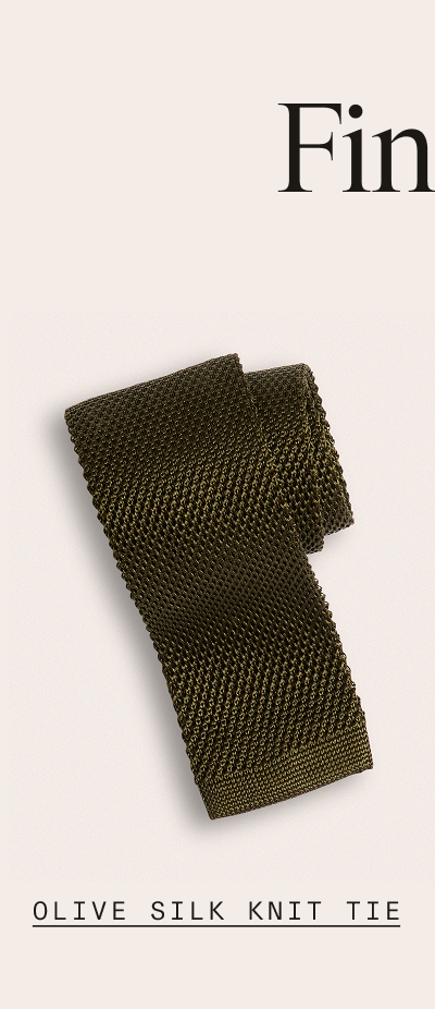 Flat lay of a folded olive knit tie with a square bottom end on a light background. "OLIVE SILK KNIT TIE"