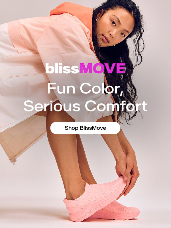 A woman wearing an orange ombre wind breaker jacket paired with the BlissMove Knit Ease Slip-On in neon coral. Text over the image says Fun Color, Serious Comfort. Shop BlissMove.