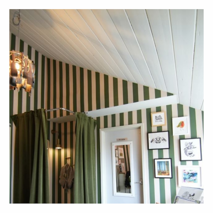 Sage green stripe wallpaper on Interior Design Masters BBC