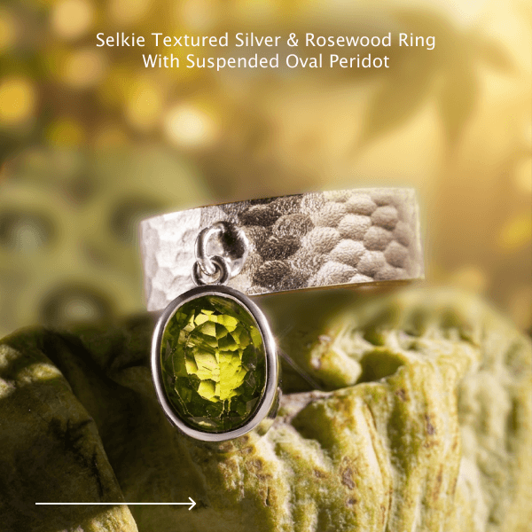 Selkie Textured Silver & Rosewood Ringwith Suspended Oval Peridot
