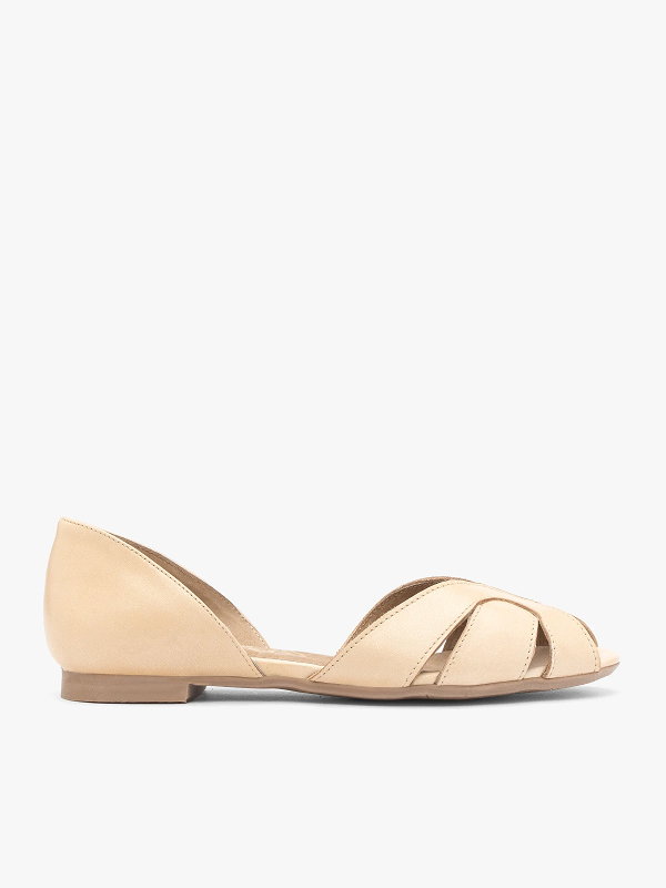 Beige open-toe flat sandal with cut-out design on a white background