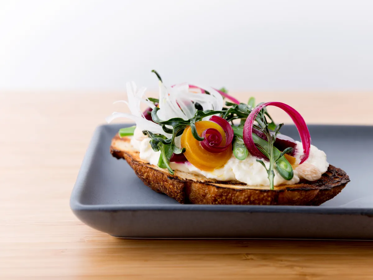 636469589993579684-Ricotta-Toast-at-Junpier-Table.jpg