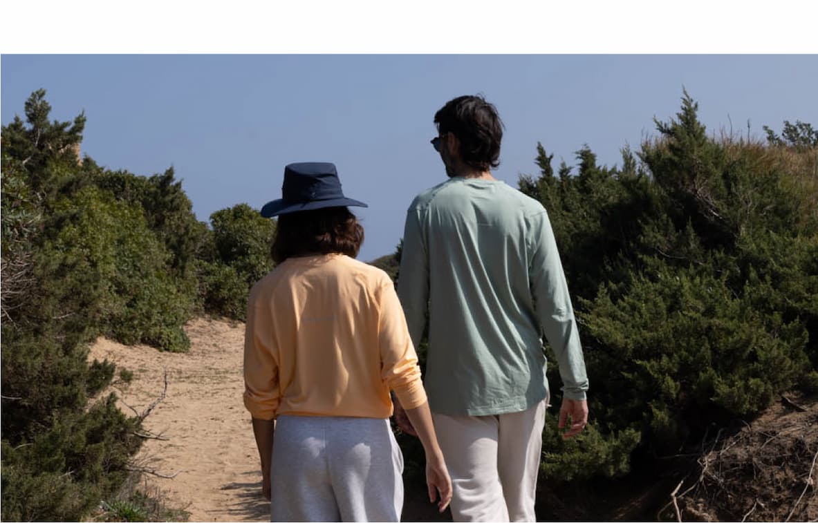 Man and woman wearing Sun Shirts and Hat