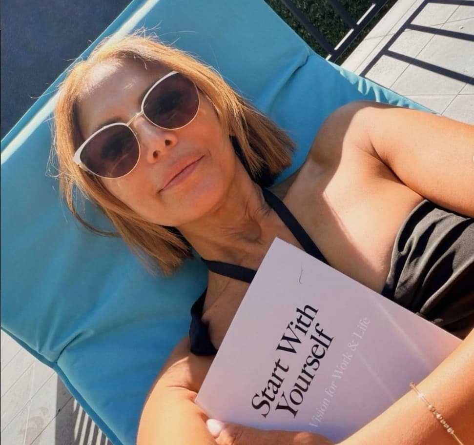 Sally reading Start With Yourself