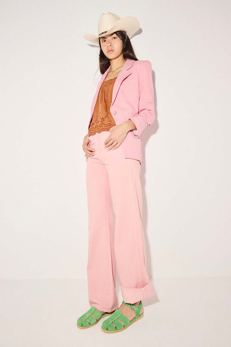 SERA fisherman in kelly green suede styled with pink pants and blazer with cowboy hat