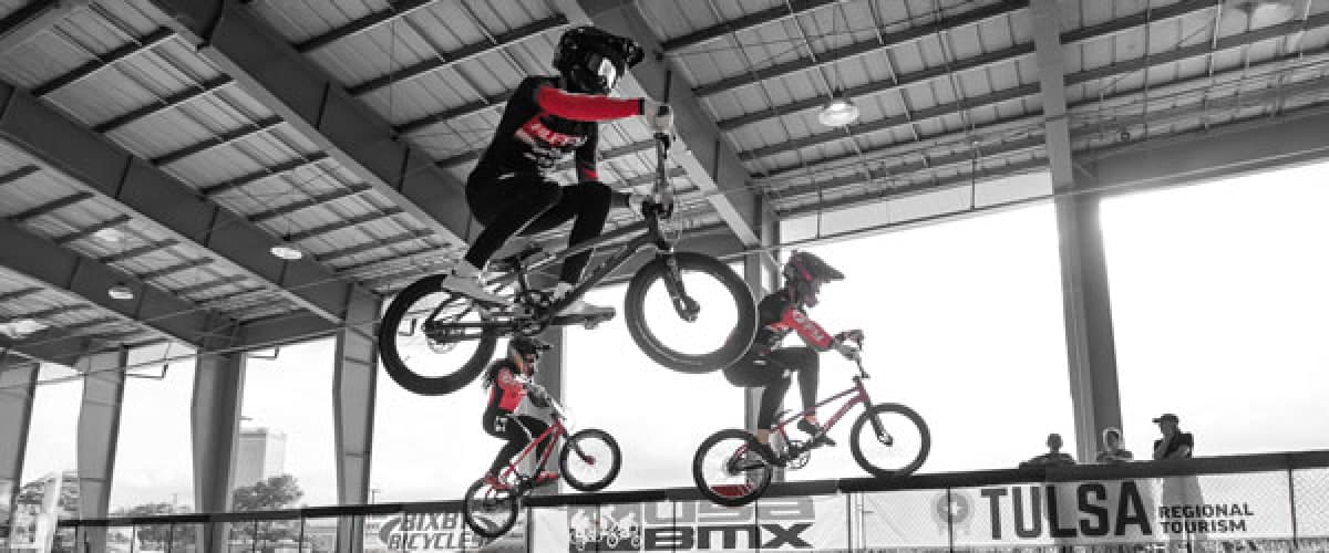 BMX riders in mid air
