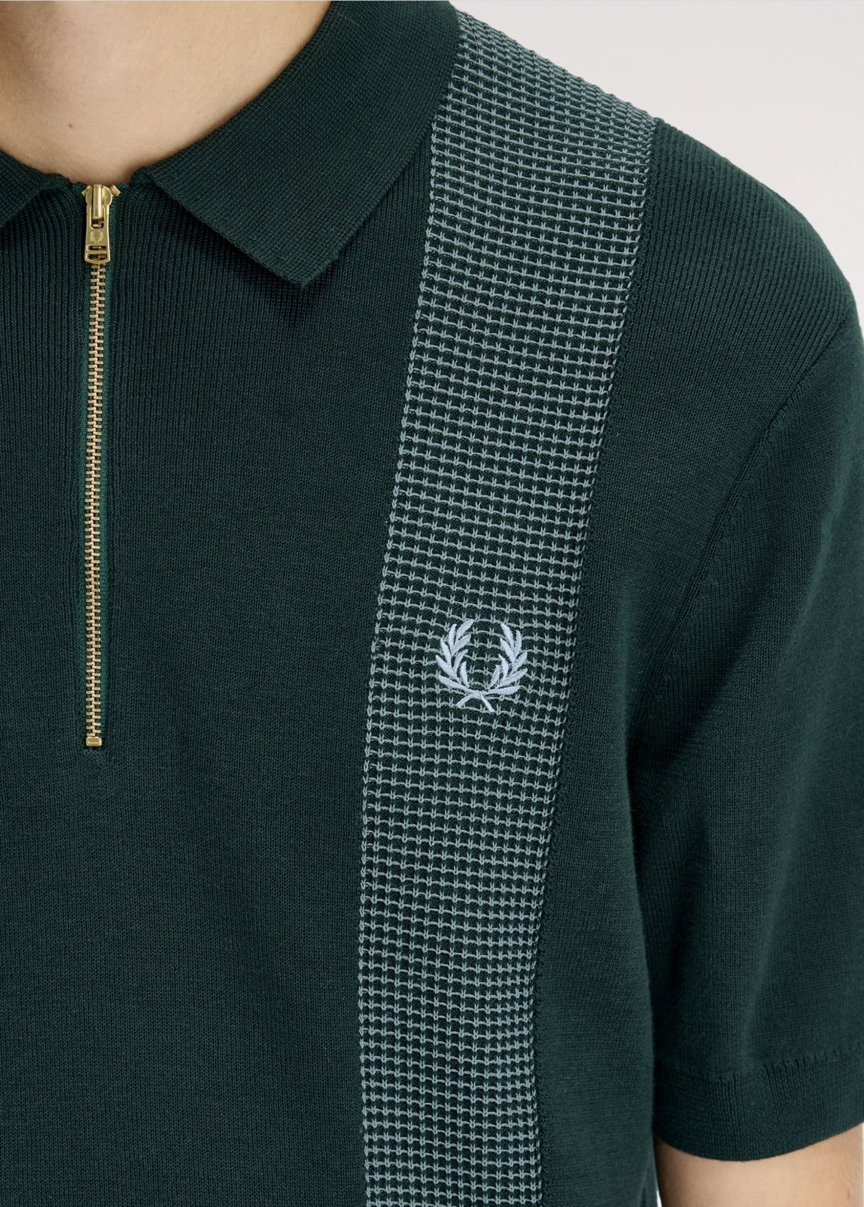 Close up of a Fred Perry Panel Detail Knitted Shirt in Grassroots Green