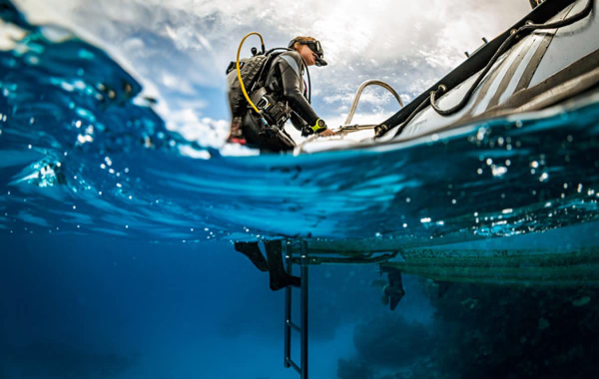 Diver getting onto boat