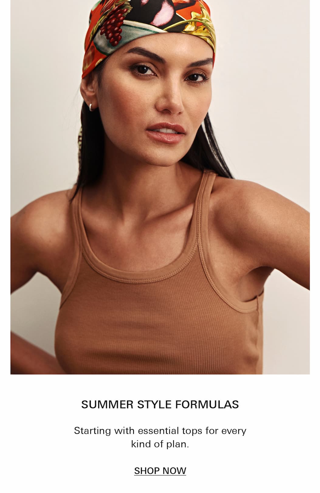 Women wears ribbed tank in toasted coconut