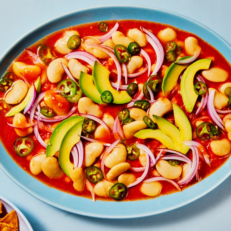 Big bean Ceviche on a blue background and blue plate