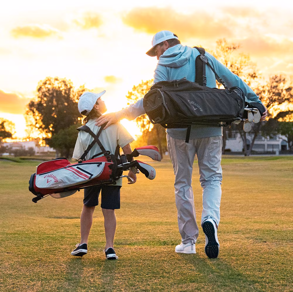 Father and Son On Golf Course