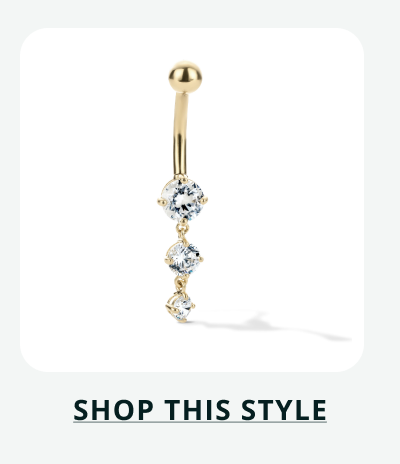 Gold barbell featuring three vertically dangling  gemstones of decreasing size. Click here to shop this style