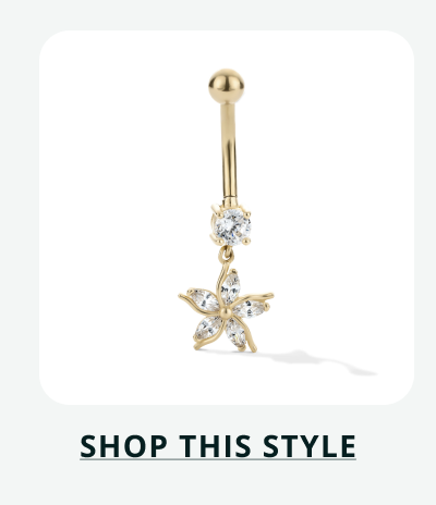 Gold curved barbell with clear stone that dangles a star with gemstone at its center. Click here to shop this style