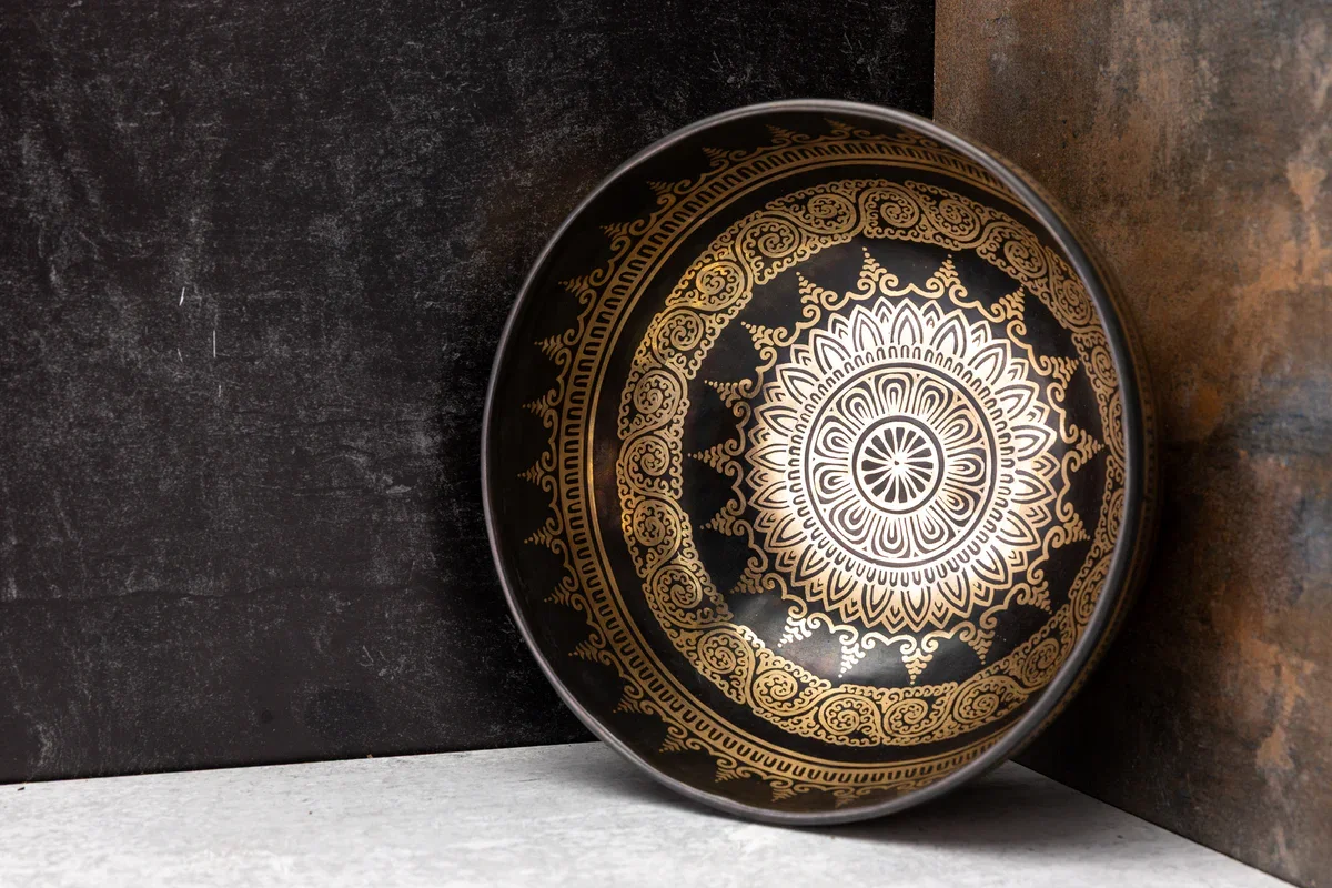 One-of-one tuned bronze bowl with geometric design