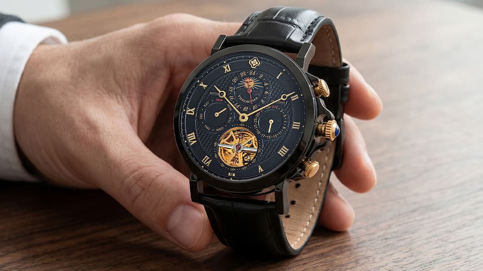 Brown color leather band with black dial and stainless steel case.