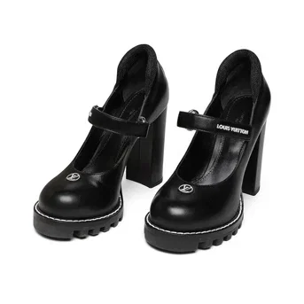 A Pair of Louis Vuitton Black Calfskin Star Trail Ankle Pumps