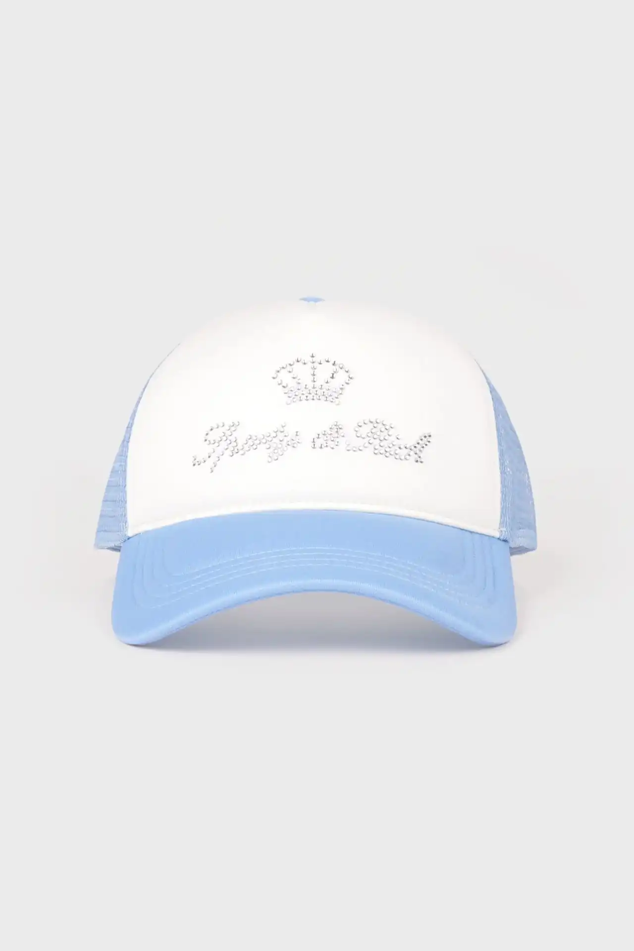 A medium shot shows a white trucker hat with a light blue brim and mesh back, featuring a silver rhinestone crown and the text 'Pretty Girl' emblazone...