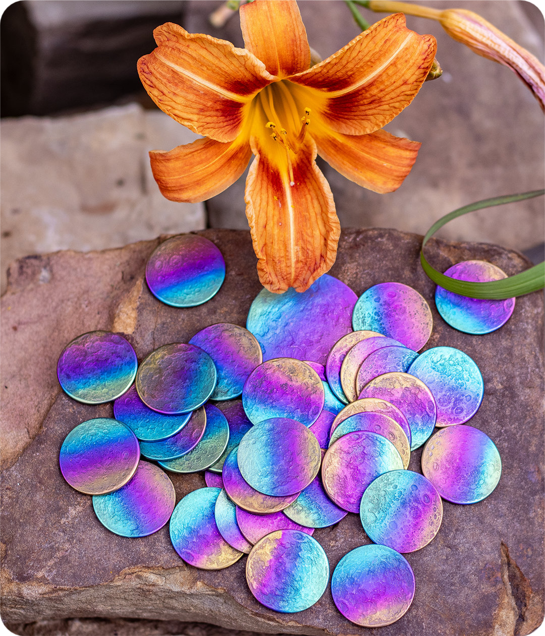 Pile of rainbow niobium coins