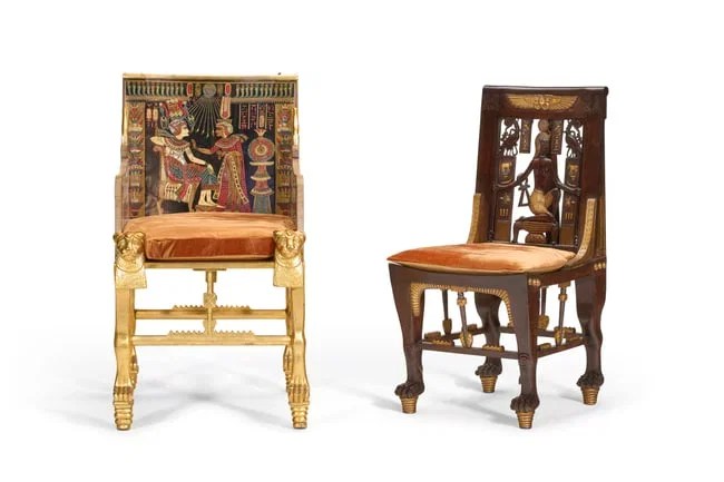 AN EGYPTIAN-REVIVAL PARCEL-GILT, POLYCHROME-DECORATED AND MOTHER-OF-PEARL ARMCHAIR AND A PARCEL-GILT