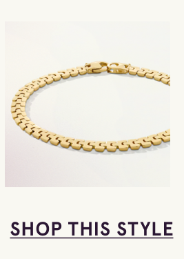 A gold panther link bracelet. Click here to shop this style
