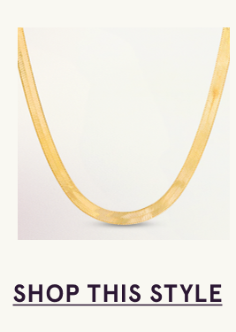 A gold herringbone necklace. Click here to shop this style