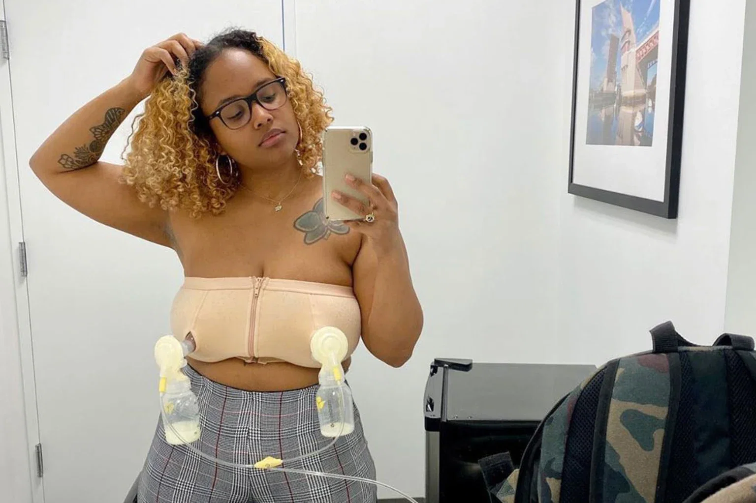 mom wearing breast pumps