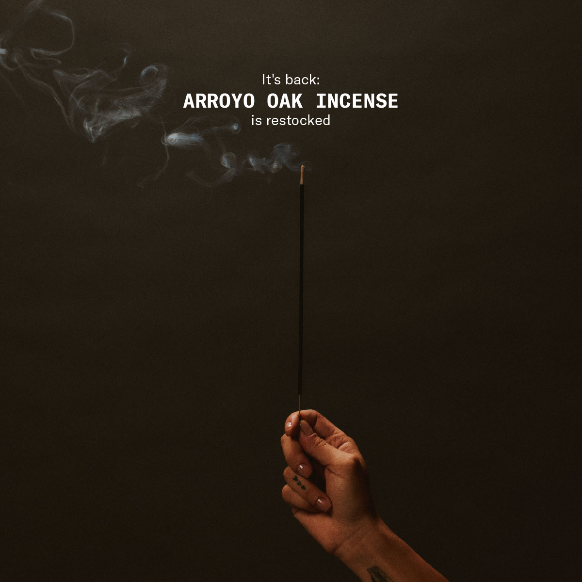 It's back: Arroyo Oak incense is restocked [hand holding lit incense stick]