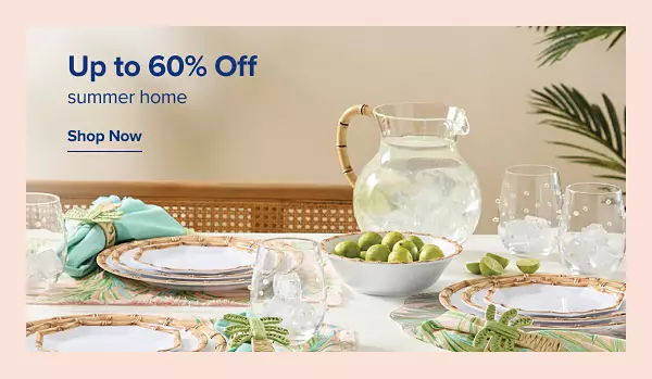 Up to 60% off summer home. Shop now. A set table with decretive dishware.