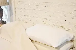 Hotel beds look the way they do for a reason—and it has nothing to do with the thread count