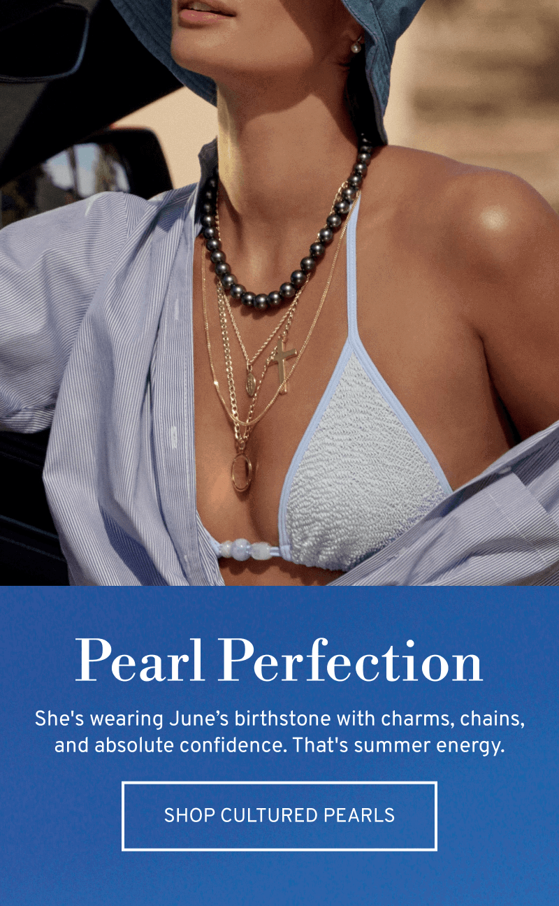 Model wearing layered necklaces. Pearl Perfection. Wear June's birthstone with charms & chains. Click to Shop Cultured Pearls