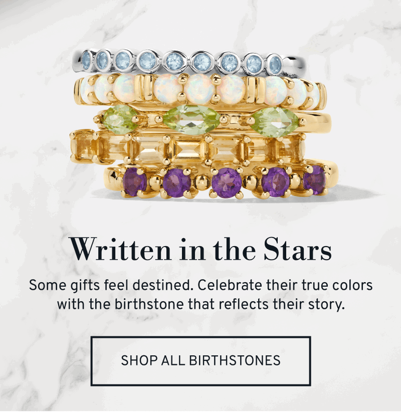 Stacked birthstone rings in gold. Written in the Stars. Celebrate their true colors. Click to Shop All Birthstones