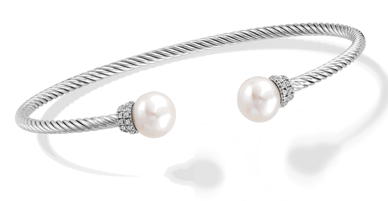 Silver twisted cable cuff bracelet with pearl and pavé diamond accents.