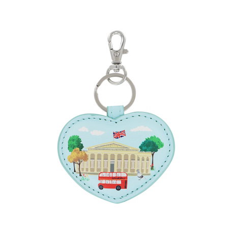 A textured blue vegan leather bag charm featuring the British Museum façade and a London bus. – Shop Now. 