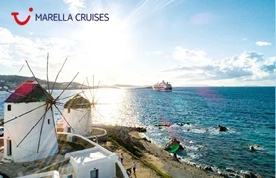 Image of a Cruise ship sailing off the coast of Mykonos.