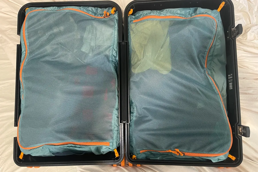 Our Favorite Backpack Brand Made a Suitcase — and It’s Pretty Good